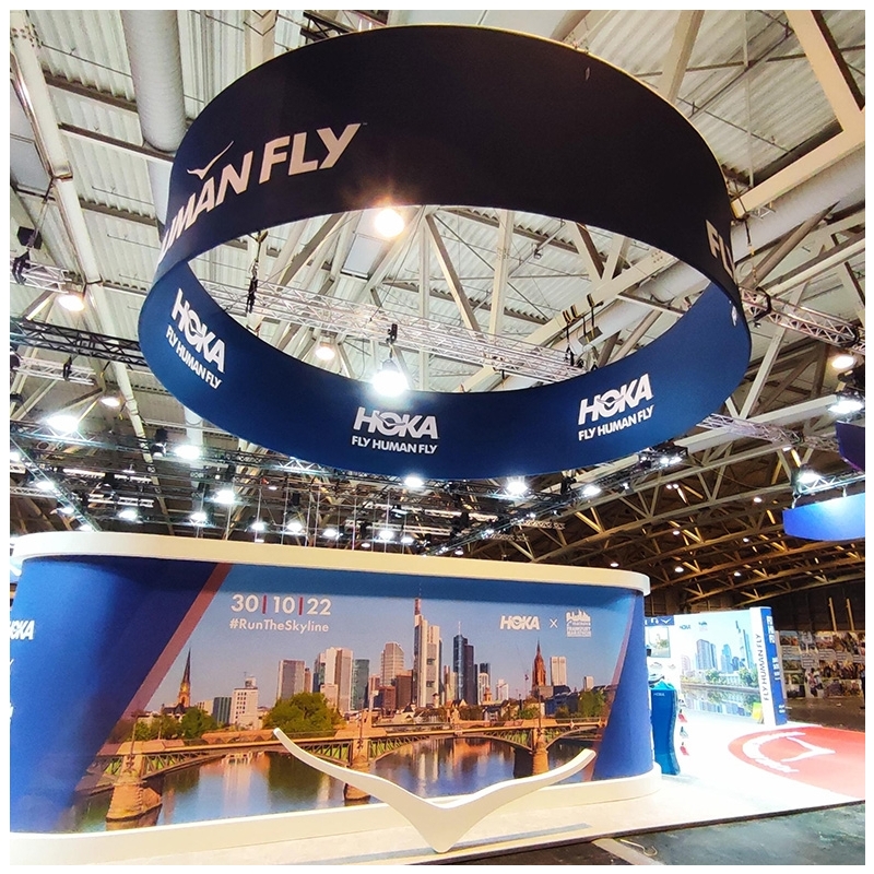 HOKA custom circular hanging banner at an exhibition
