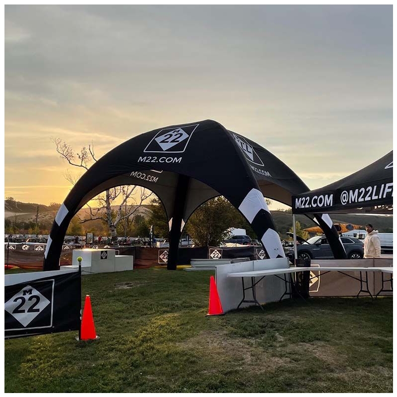Spider Dome X1 branded inflatable structure at an outdoor event