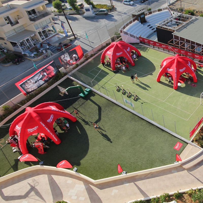 Large custom branded inflatable Spider Domes used at an outdoor sporting event