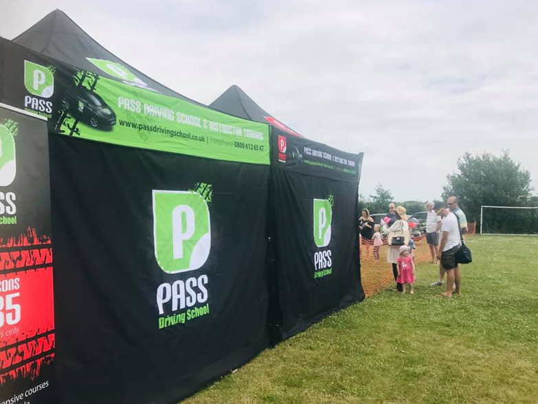 Pass Driving School gazebo Pass Driving School gazebo rear wall at outdoor event